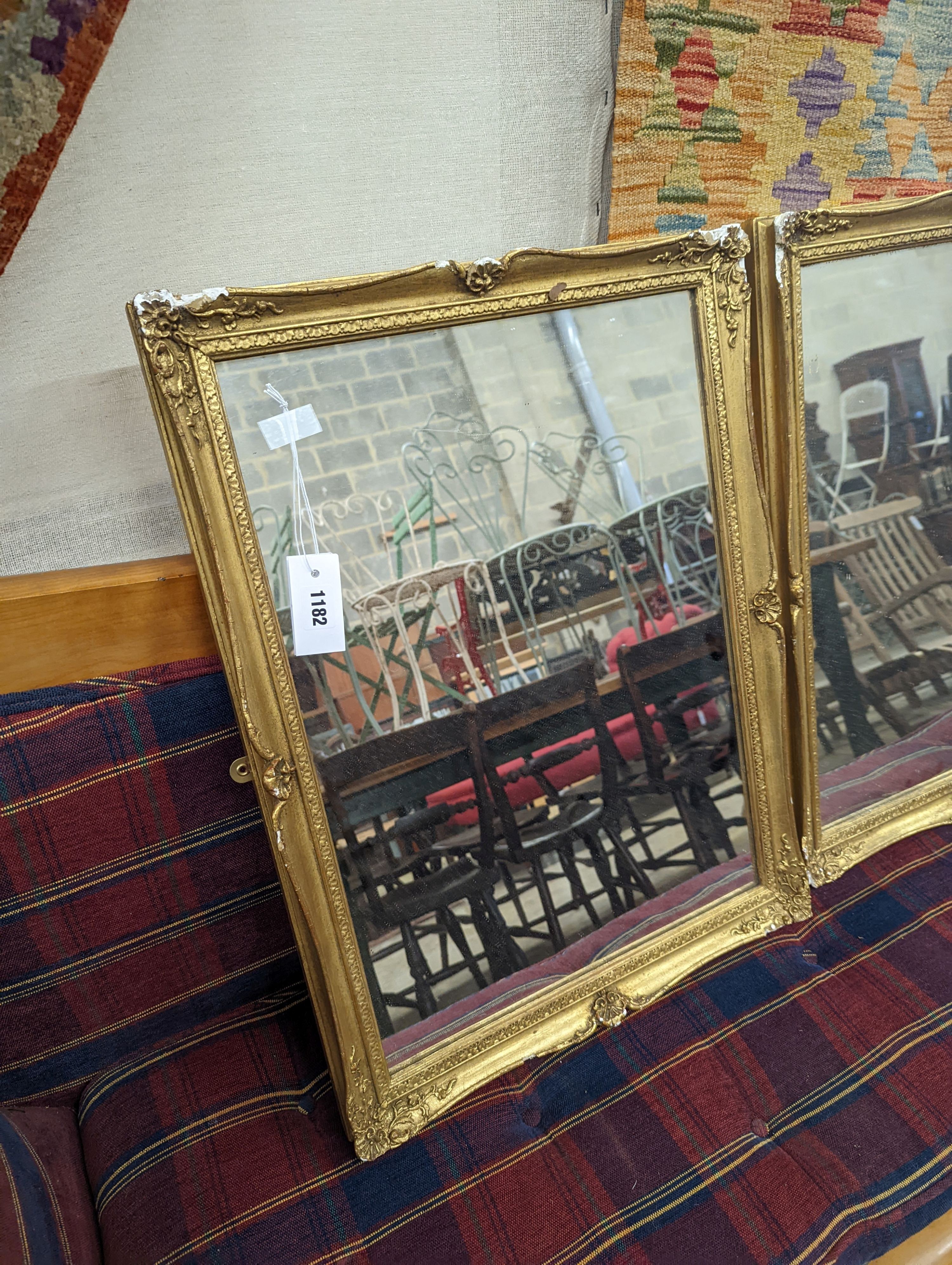 A pair of rectangular gilt gesso wall mirrors, width 48cm, height 64cm